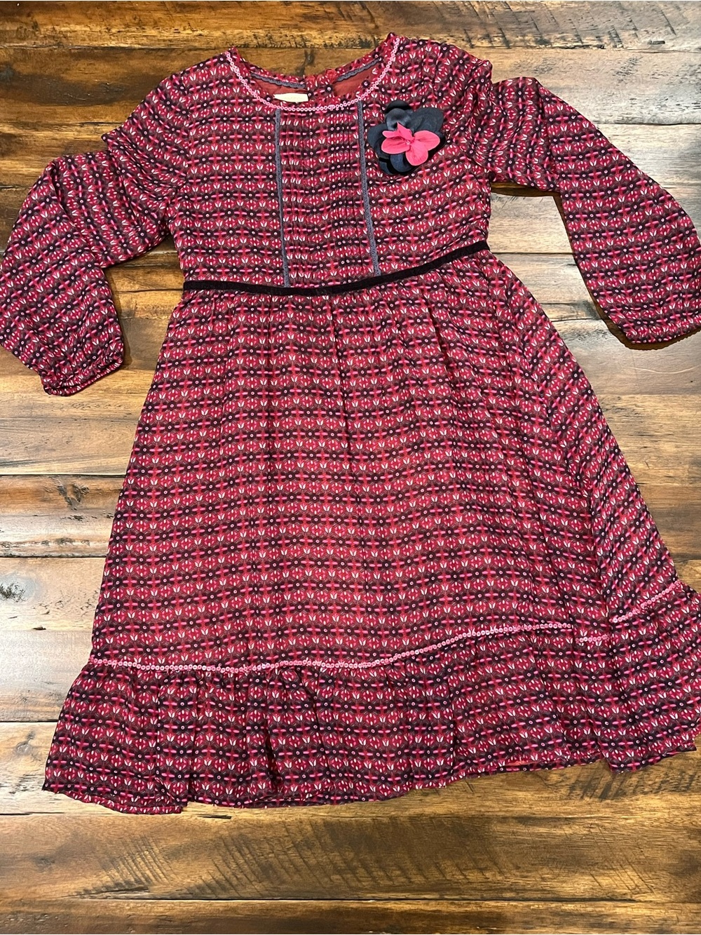 Monsoon Patterned Long-Sleeve Girls Dress with Flower Pin